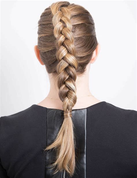 How to dutch fishtail braid step by step. Split the hair in 2 equal sections and clip one side up, so it’s out of the way when braiding. Take a small section of hair at the front and split it into 2 equal sections so you have a top strand, close to the middle part and a bottom strand, the strand closest to your ear.